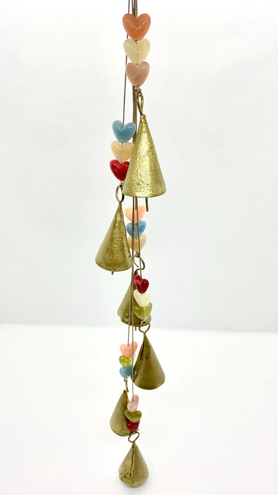 Delicate wind chimes with vintage bells and heart-shaped beads for home and garden. Decoration. Gift. Witch bell. Brass bell. Boho.