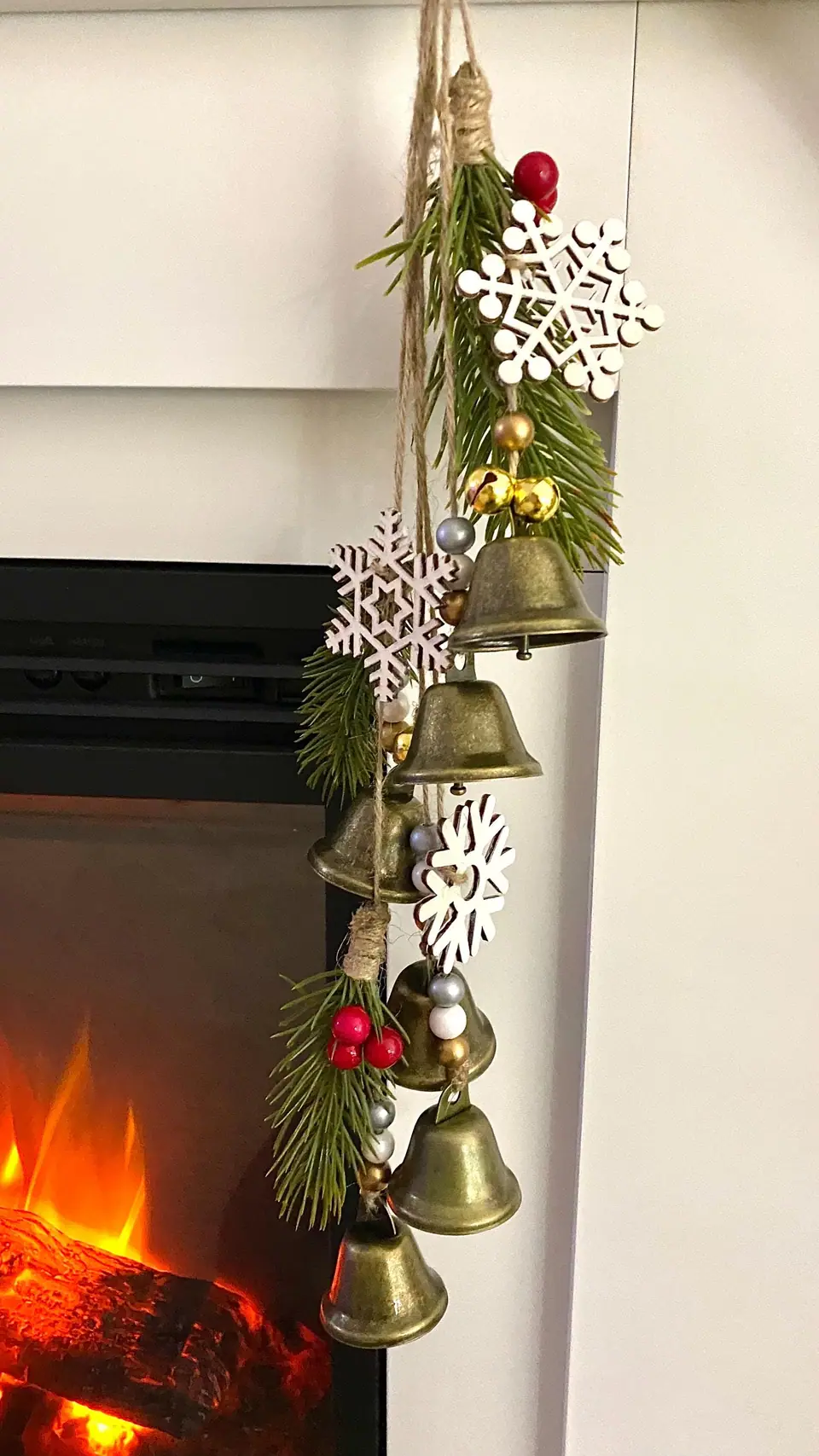 Festive wind chimes “Winterklang” for home decoration. Decoration for fireplace. Brass bell, cow bell. Rustic chimes. Christmas.