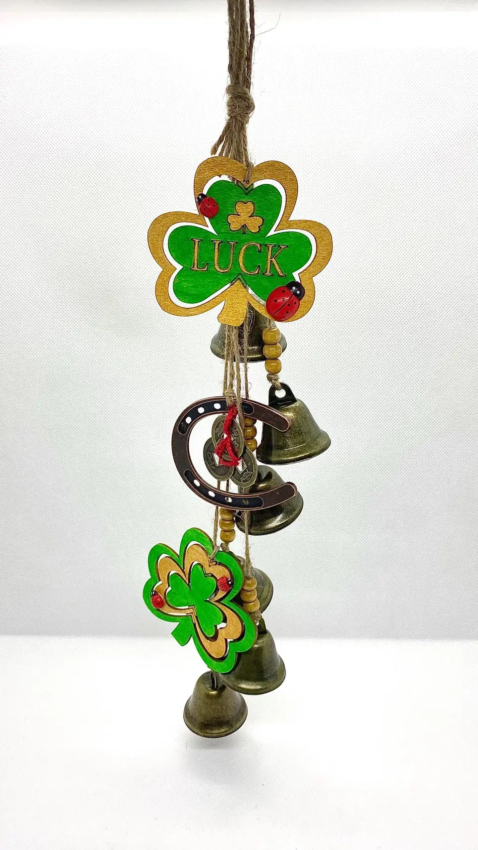 Happiness and wealth wind chime as a home decoration and as a gift. New Year's Eve. Gift. Vintage bells. New Year's gift. Chimes.