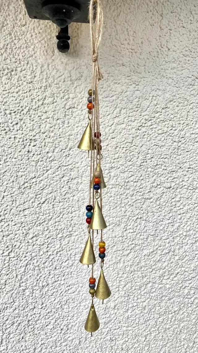 Wind chime made from vintage bells and colorful ceramic beads for home and garden decoration. Chime with witch bell. Cowbell Boho decoration (photo 2)